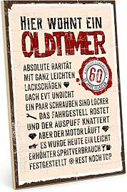 TypeStoff Holzschild mit Spruch – Hier wohnt ein 