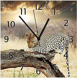 Wallario Design-Wanduhr Leopard auf Baumstamm in