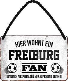 WOGEKA ART Retro Blechschild - Hier wohnt ein